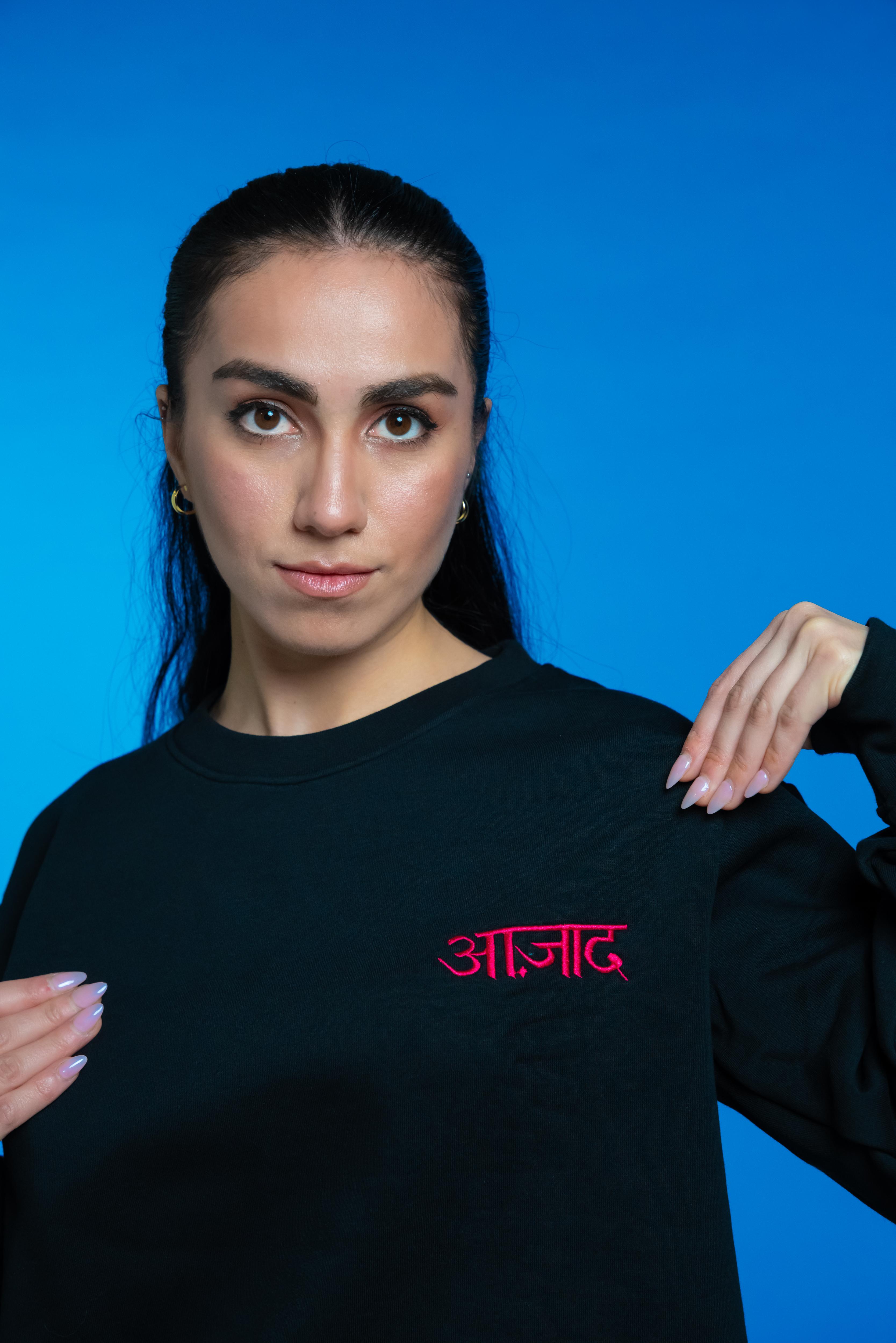 Premium 420 GSM jersey cotton sweatshirt with 'Aazad' embroidered in Hindi, offering a minimalist design, structured fit, and sustainable comfort.