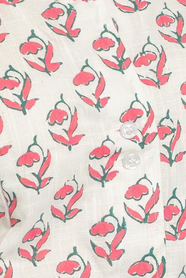 Handwoven cotton waistcoat with floral block-print motifs, tailored fit, and artisanal detailing—styled for modern, sustainable fashion.