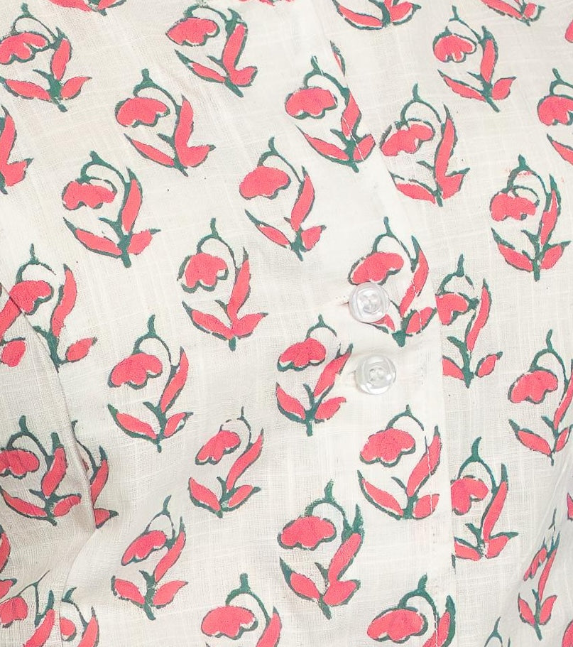 Handwoven cotton waistcoat with floral block-print motifs, tailored fit, and artisanal detailing—styled for modern, sustainable fashion.