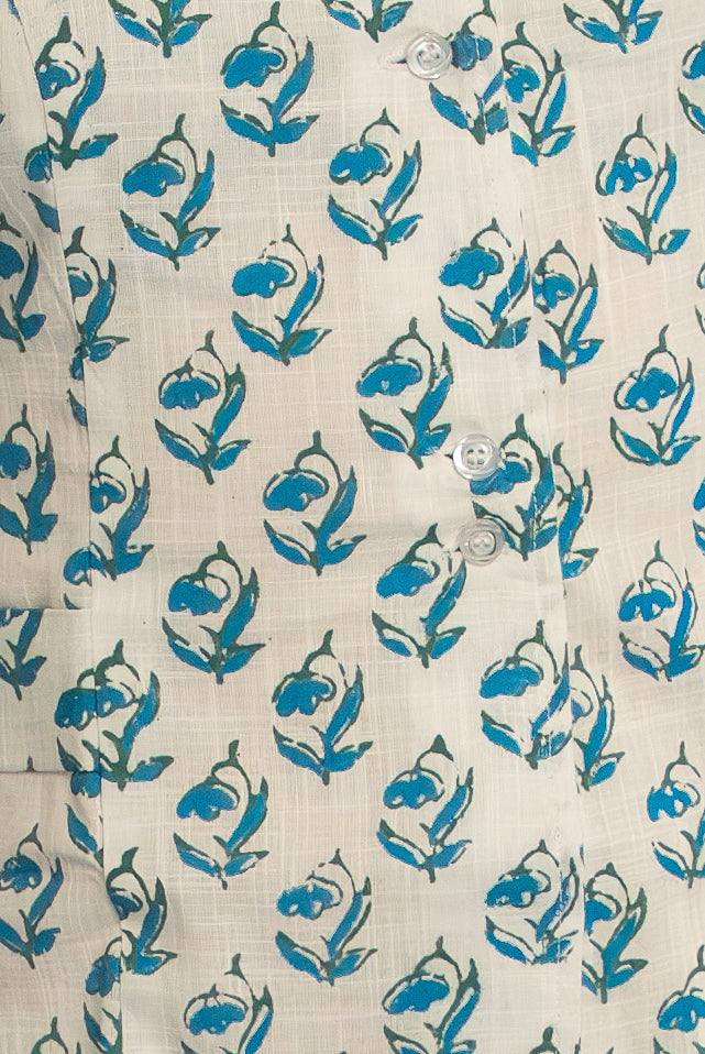 Handwoven cotton waistcoat with floral block-print motifs, tailored fit, and artisanal detailing—styled for modern, sustainable fashion.