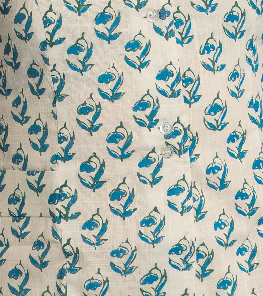 Handwoven cotton waistcoat with floral block-print motifs, tailored fit, and artisanal detailing—styled for modern, sustainable fashion.