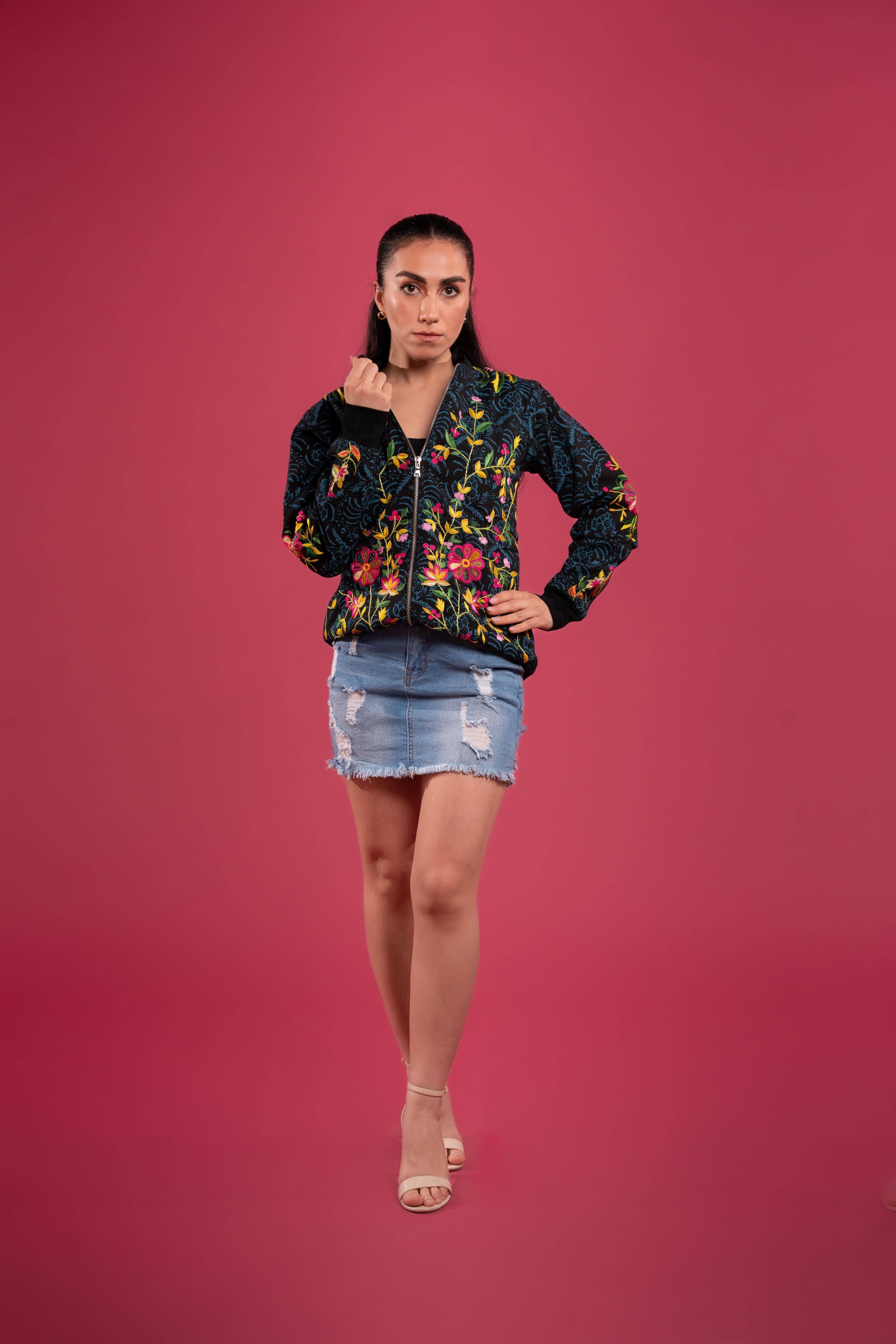 Hand block-printed bomber jacket with dyes, with floral embroidery and a bold hand-embroidered tiger on the back.