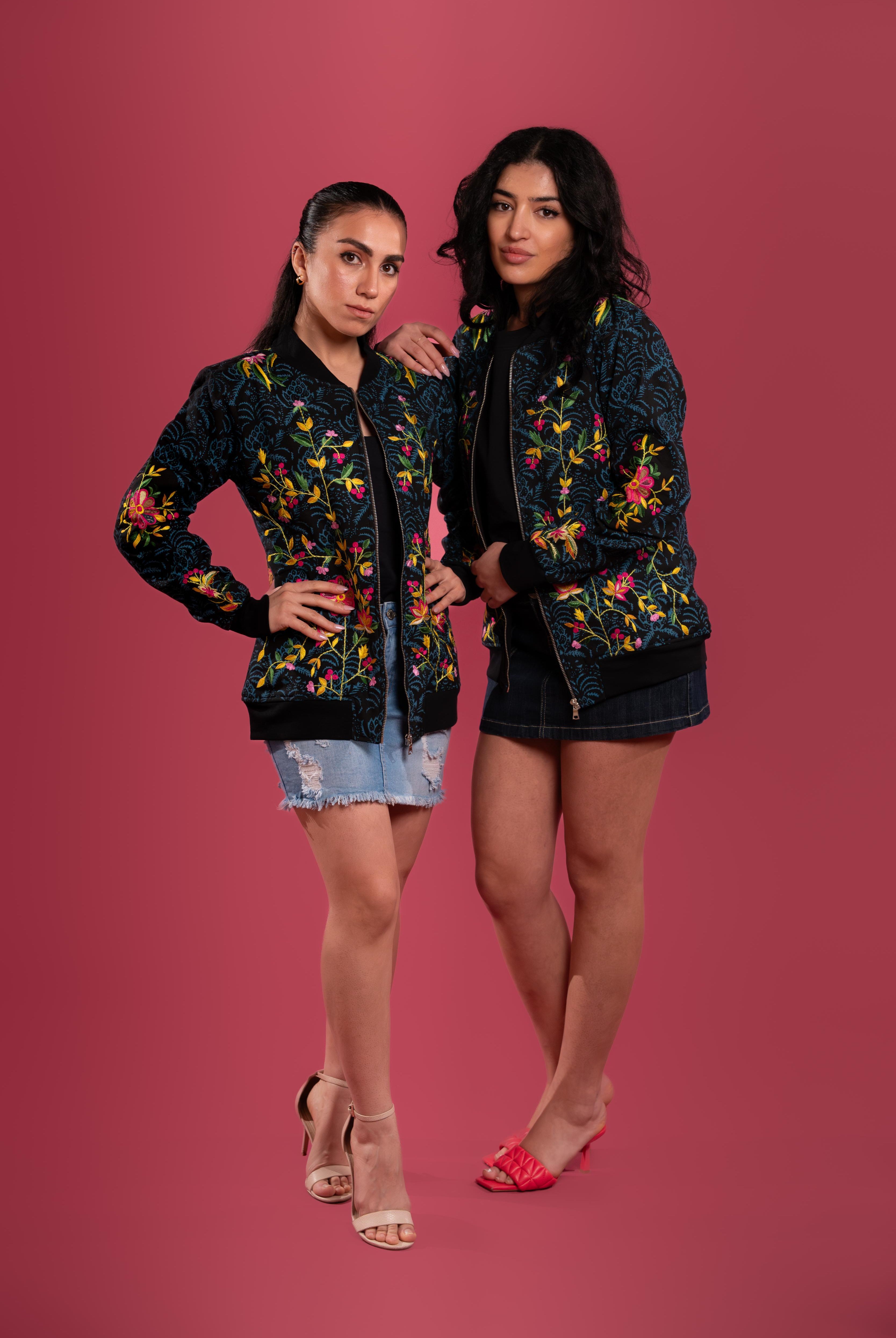 Hand block-printed bomber jacket with dyes, with floral embroidery and a bold hand-embroidered tiger on the back.