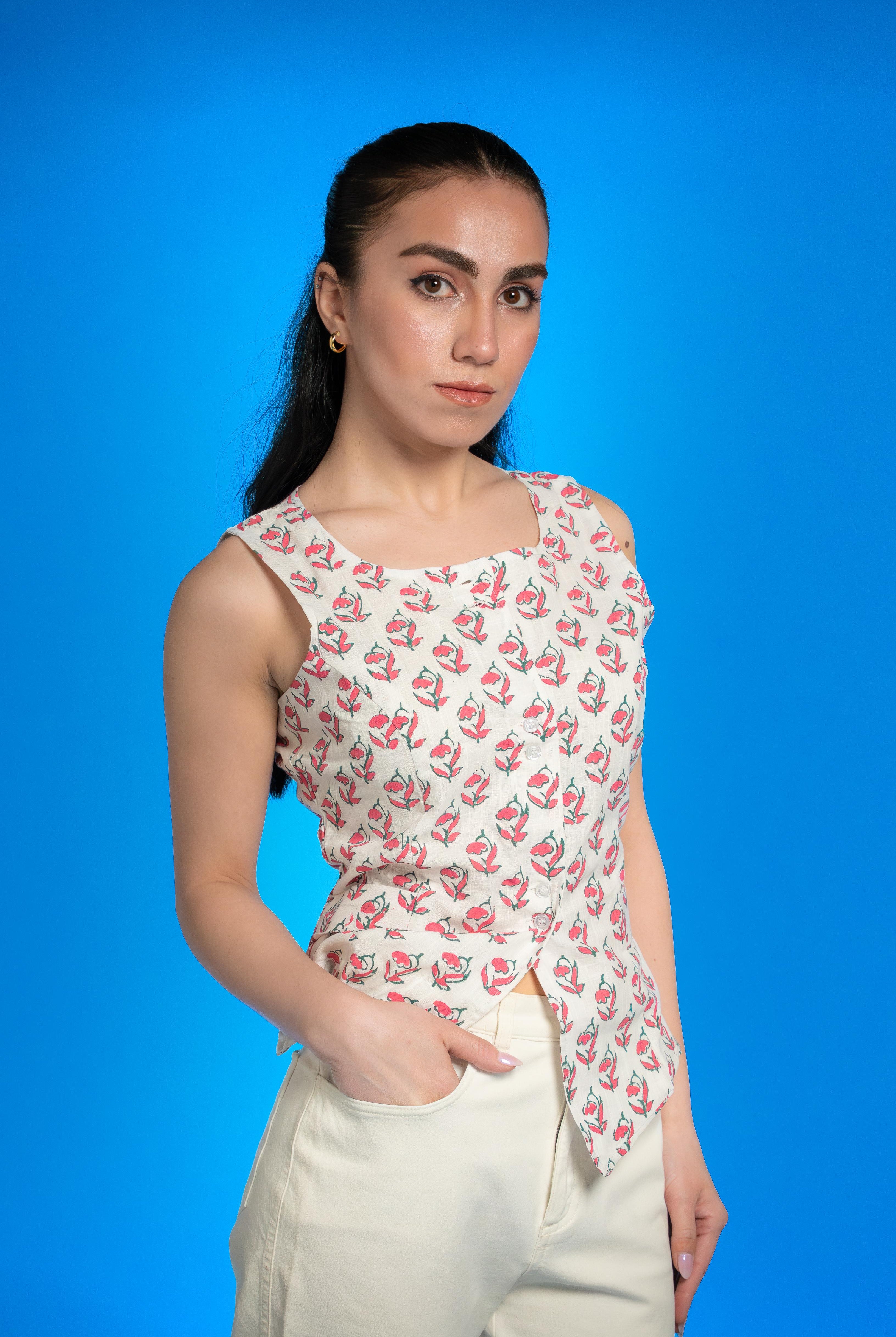 Handwoven cotton waistcoat with floral block-print motifs, tailored fit, and artisanal detailing—styled for modern, sustainable fashion.