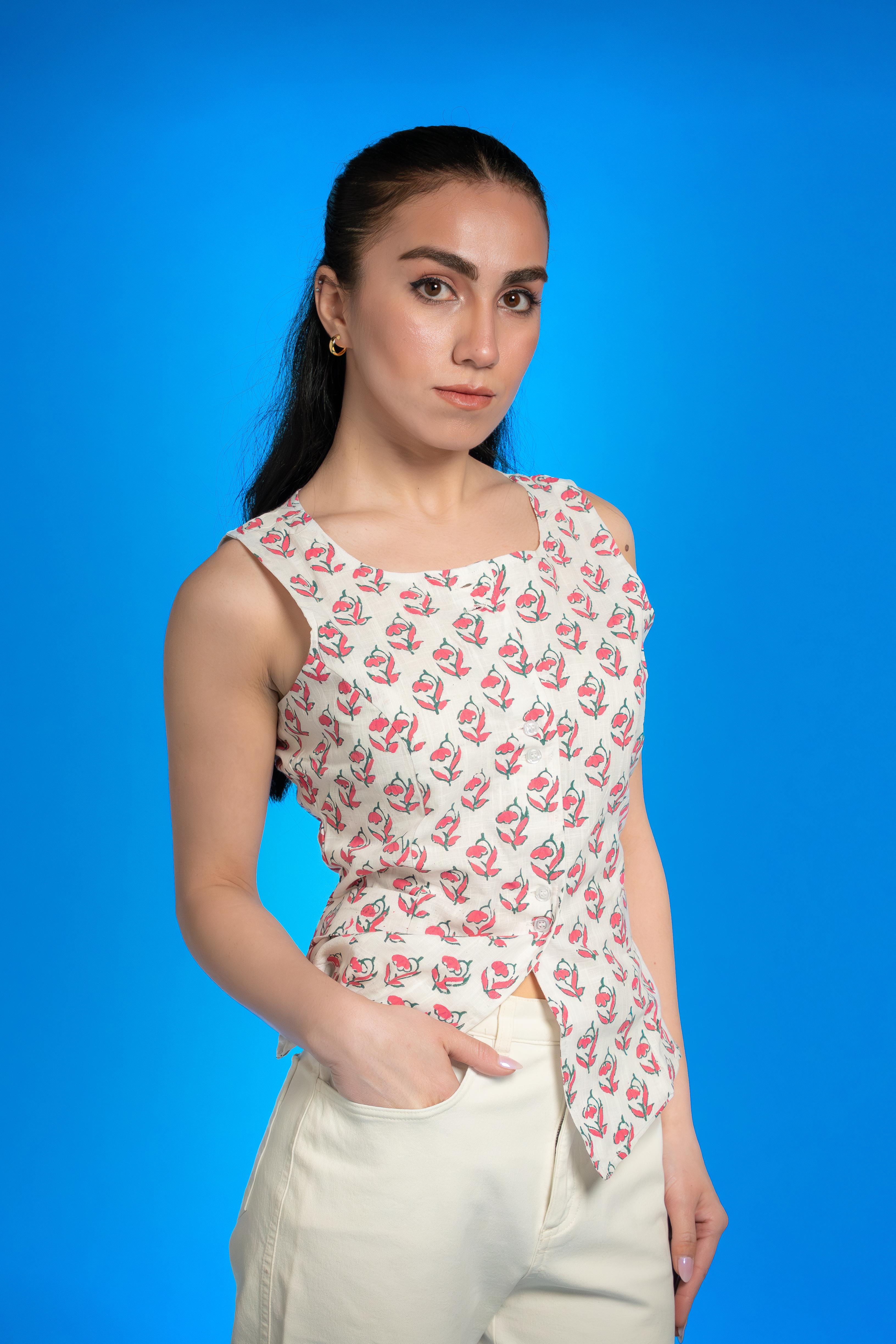 Handwoven cotton waistcoat with floral block-print motifs, tailored fit, and artisanal detailing—styled for modern, sustainable fashion.