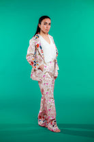 Artisan-crafted blazer and pants set featuring digital printed bird and foliage motifs with vibrant hand embroidery—designed for a cohesive, elegant, and sustainable look.