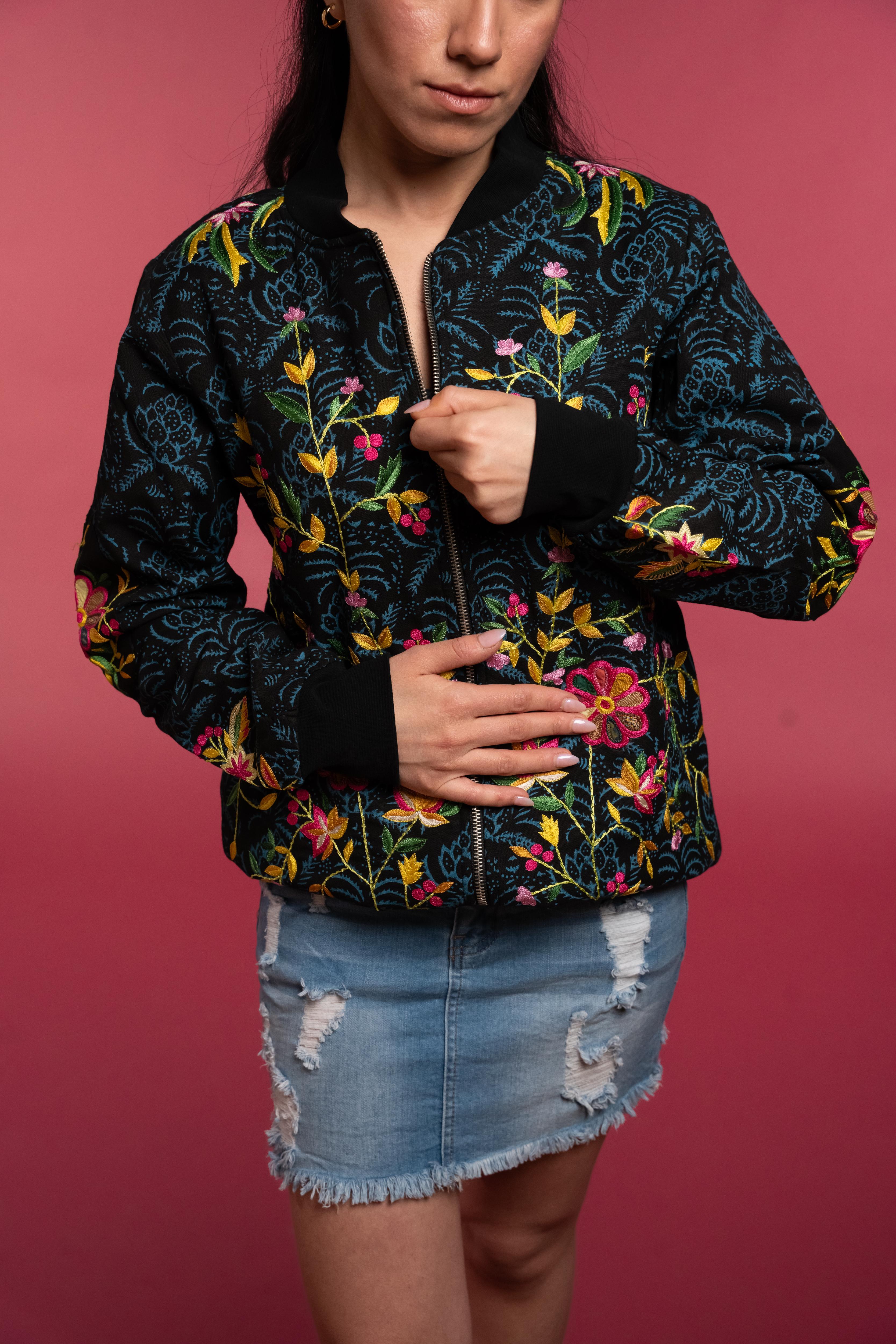 Hand block-printed bomber jacket with dyes, with floral embroidery and a bold hand-embroidered tiger on the back.